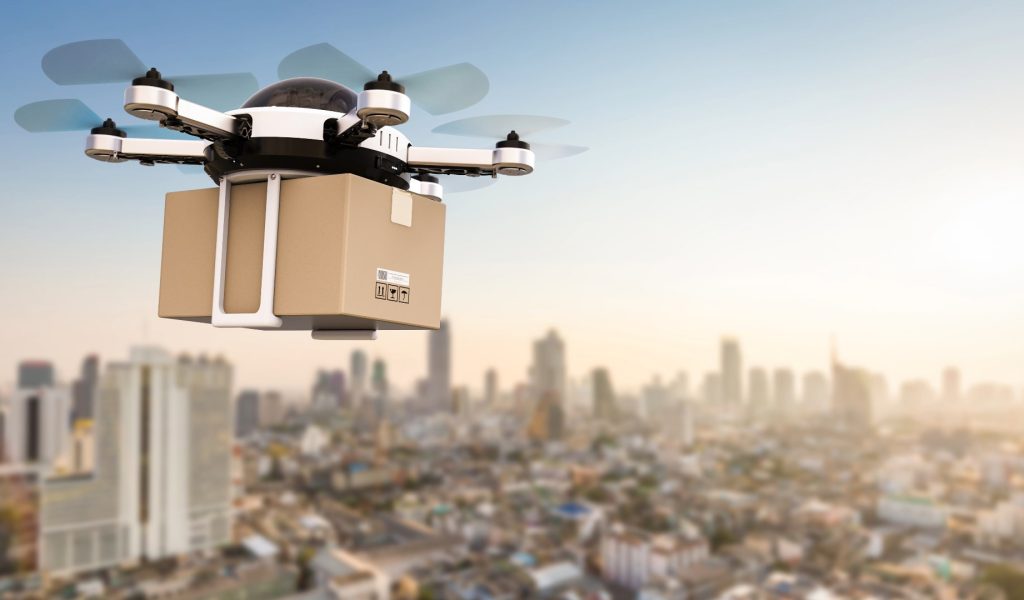 aerial drone delivery over city